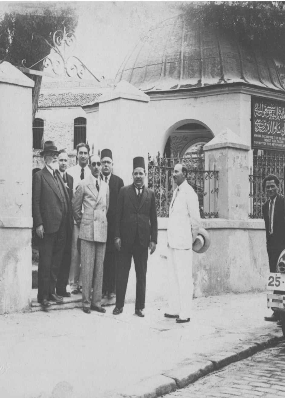 A group of officials, including the sculptor Konstantinos Dimitriadis (in white suit) and the architect of the Egyptian Royal Court, Ernesto Verucci Bey (with the white beard), outside the mausoleum of Mohammed Ali’s mother. Kavala, c. 1932. I. Kapaios’ Archive